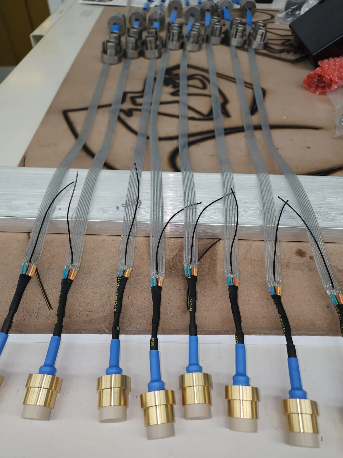 Electrical wire harness assemblies undergoing production